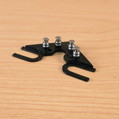 Low-angle profile view of the Dietrich Parts String Butler V3 highlighting the roller posts