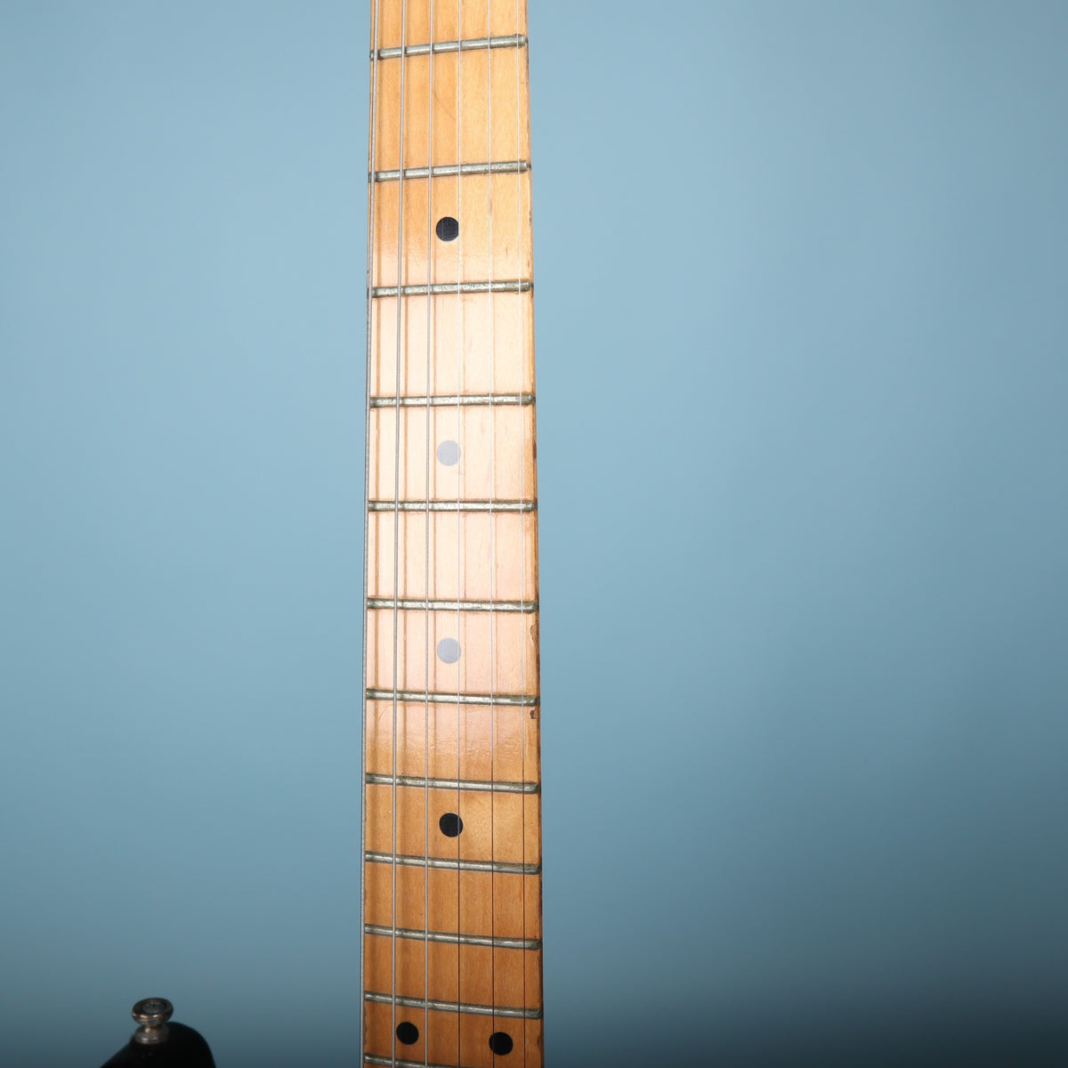 Close-up of the maple fretboard and frets on the Peavey T-15.