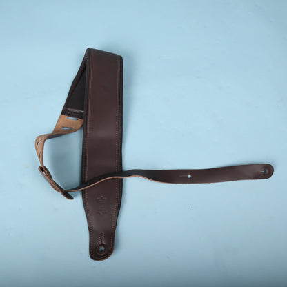 Levy's 3-inch padded leather bass strap laid out against a light blue background