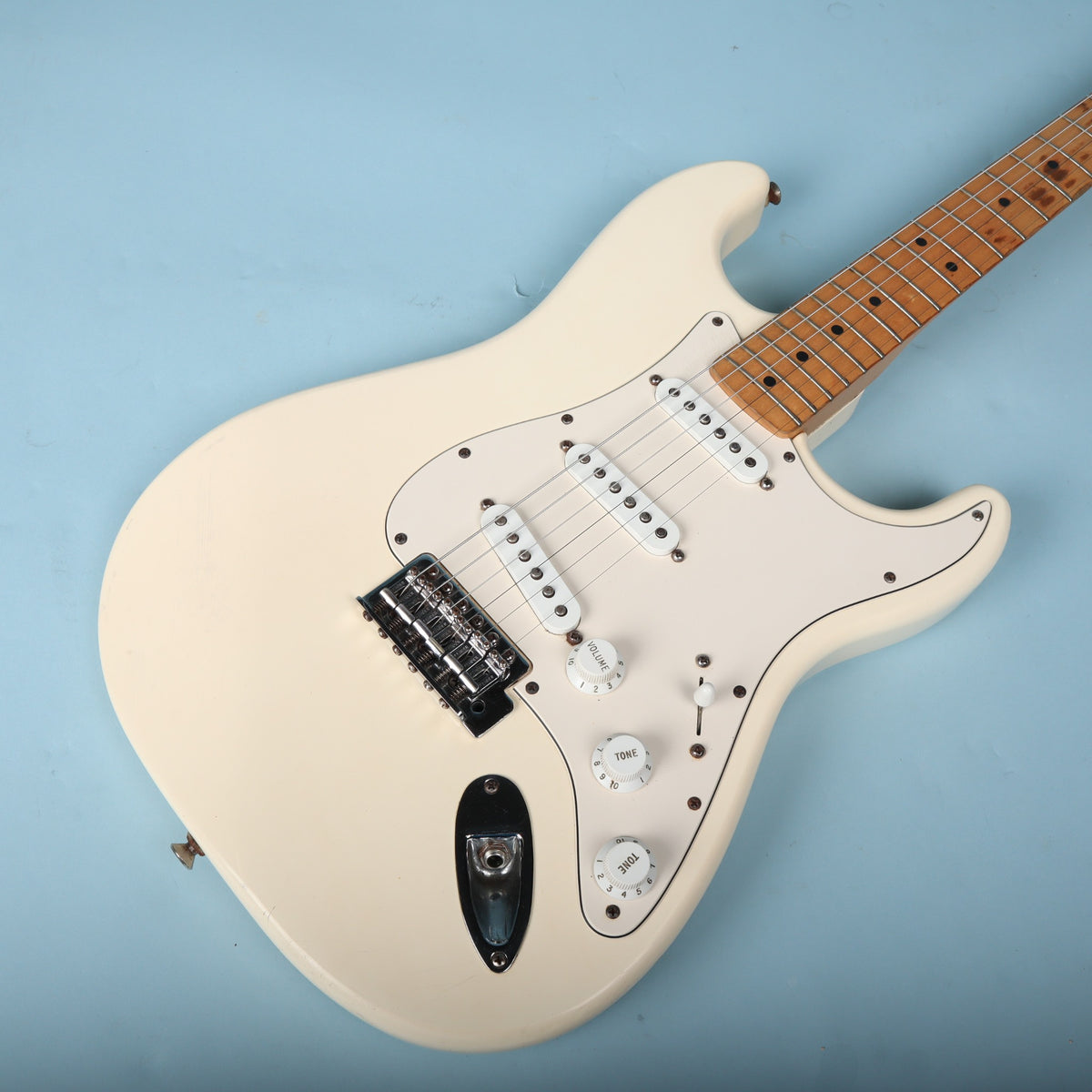 Angled front body shot highlighting finish contours and controls