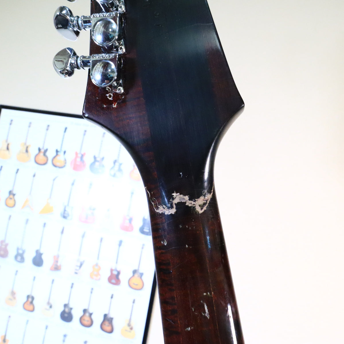 Detail of the repaired crack on the back of the neck below the headstock transition.