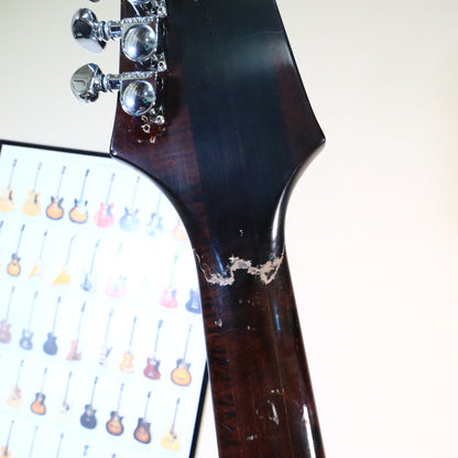 Detail of the repaired crack on the back of the neck below the headstock transition.