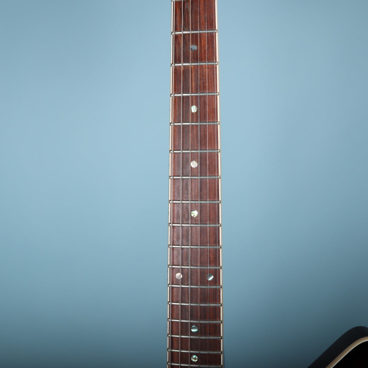 Rosewood fretboard with dot inlays and fretwire on Dean ML electric guitar