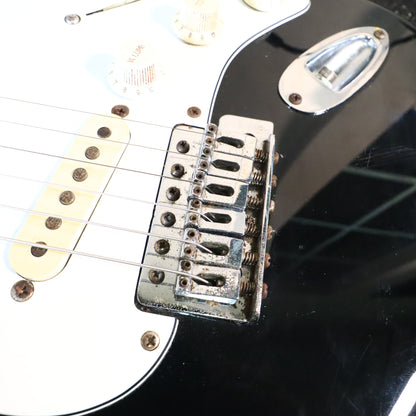 Close-up of the bridge saddles and tremolo plate