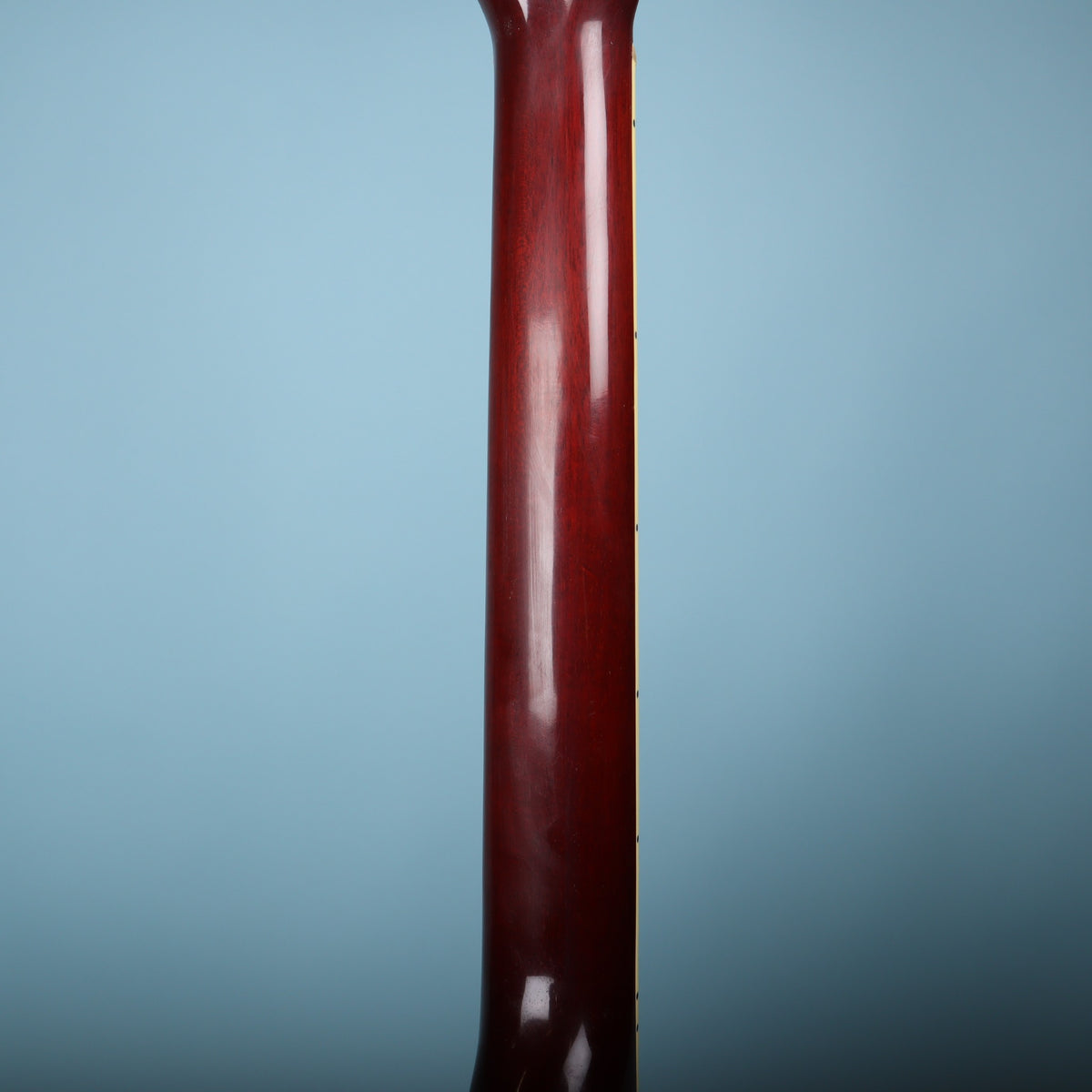 The smooth mahogany neck back profile.
