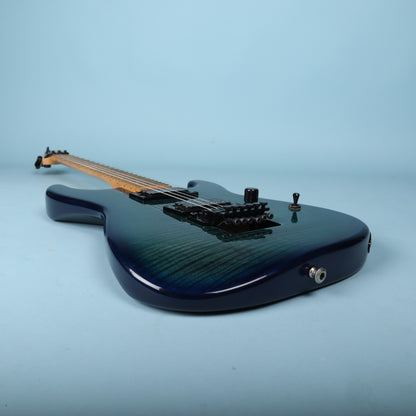 Angled side view of guitar body and controls