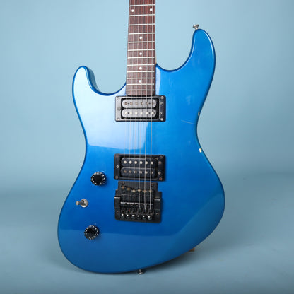 Front view of the Guild Flyer electric guitar body in metallic blue