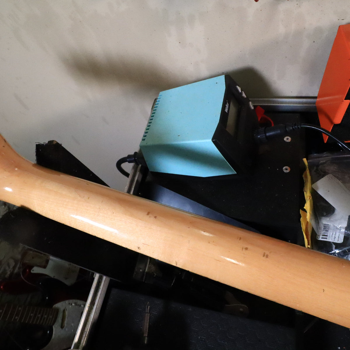 Back of the neck resting on the technician bench.