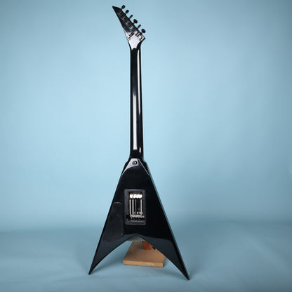 Full back view of the Jackson King V guitar on a stand