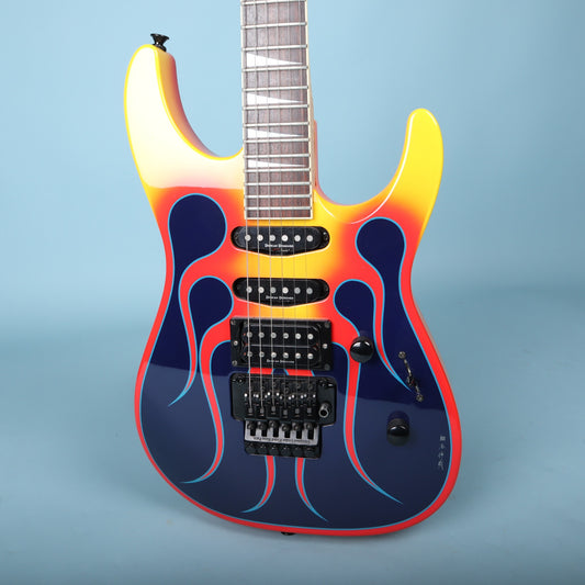 Front view of Jackson electric guitar with flame graphic finish and HSS pickup layout