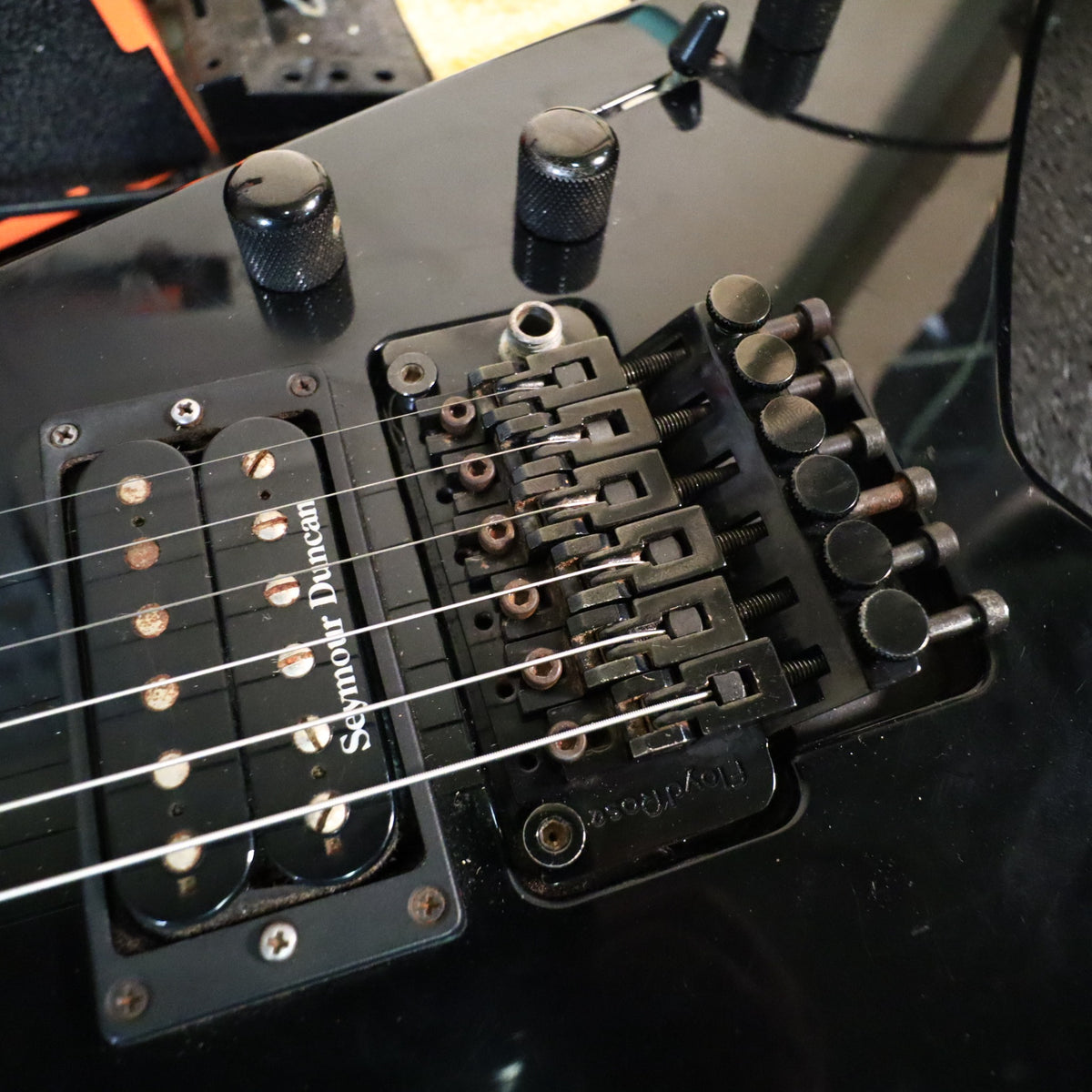 Close-up of the Seymour Duncan bridge pickup and Floyd Rose double-locking tremolo