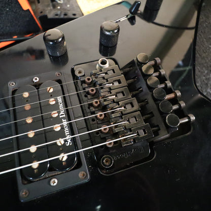Close-up of the Seymour Duncan bridge pickup and Floyd Rose double-locking tremolo