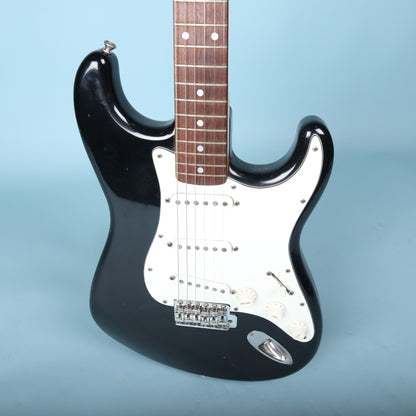 Close-up of lower neck fretboard and upper body double cutaway.