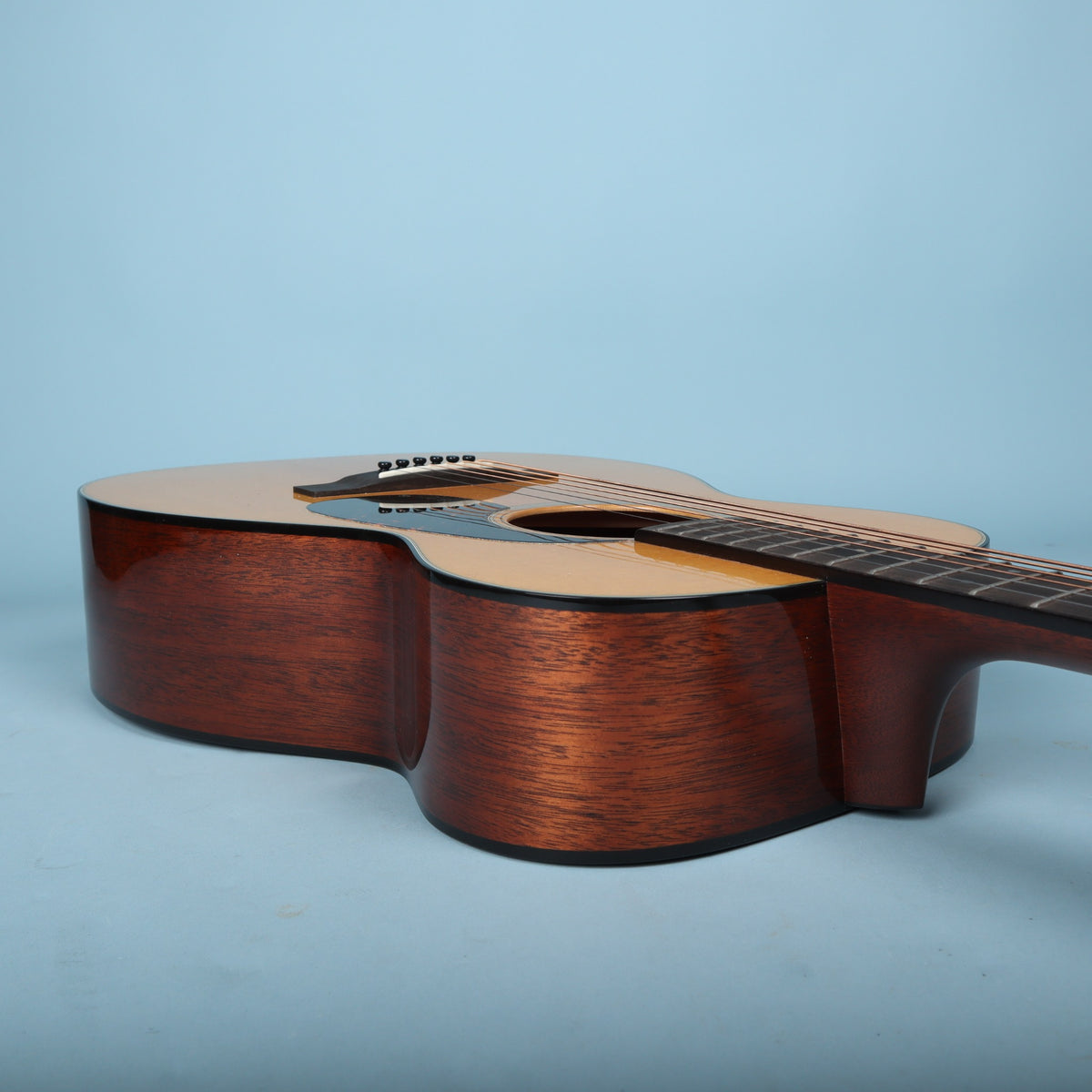 Angled view of the bass-side upper bout and neck joint on the Martin 0-18.