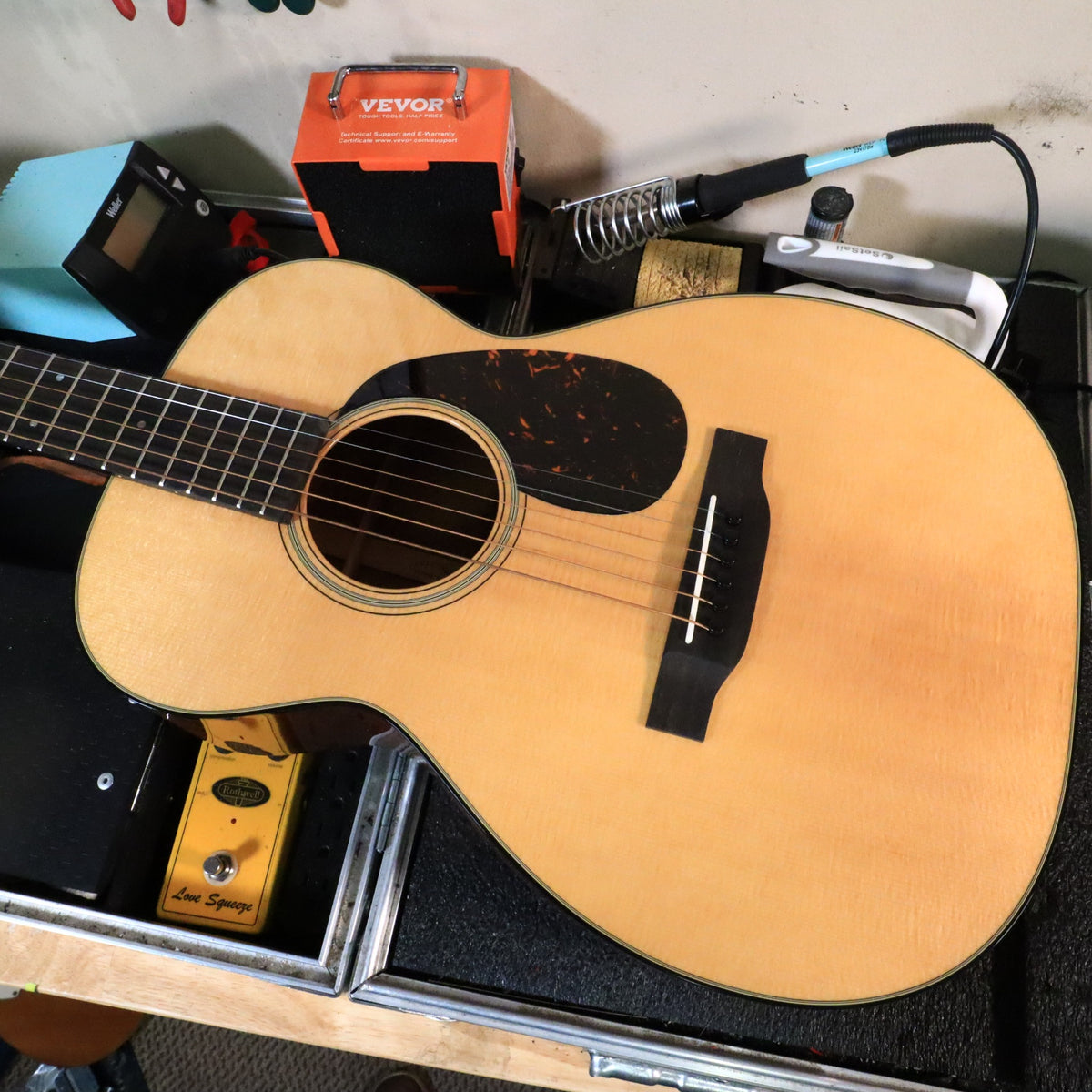 Top view of the Martin 0-18 soundboard on a workbench case.