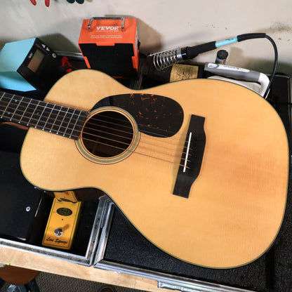 Top view of the Martin 0-18 soundboard on a workbench case.