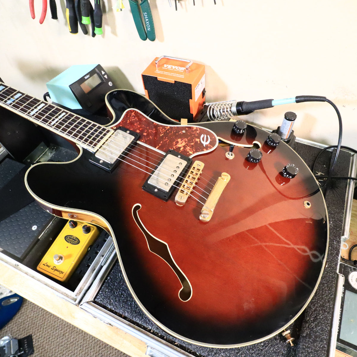Epiphone Sheraton on workbench with soldering tools