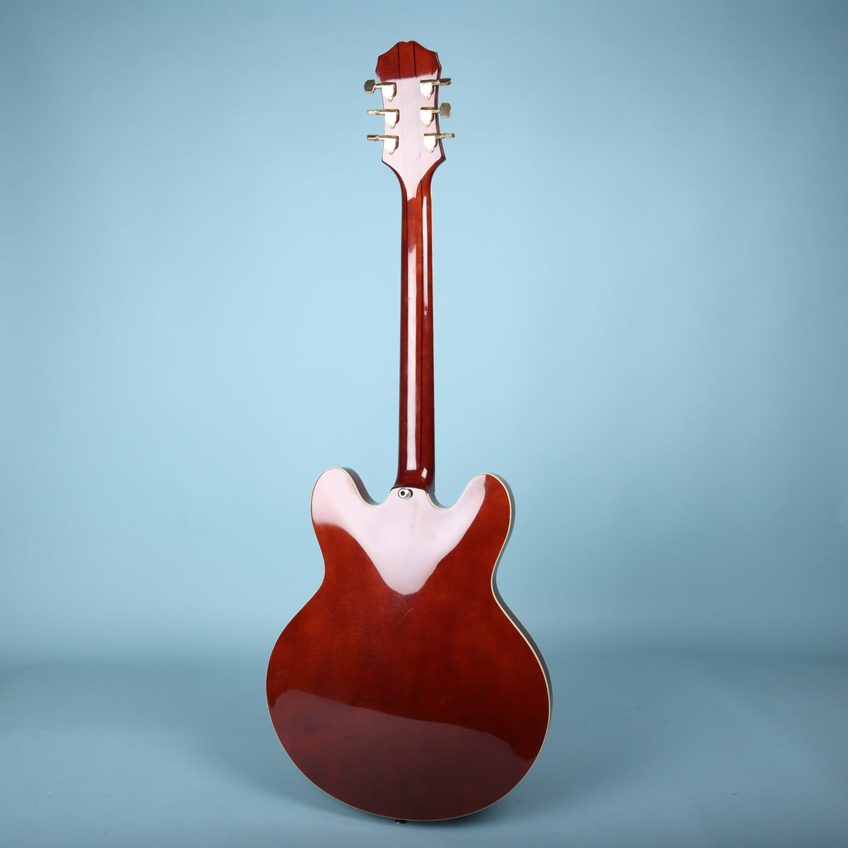 Back view of guitar body and neck heel