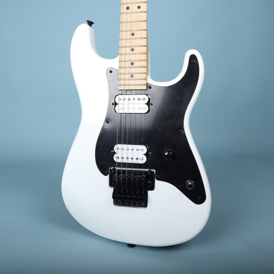 Front view of white Charvel Custom Shop So-Cal body with black pickguard and Floyd Rose bridge.