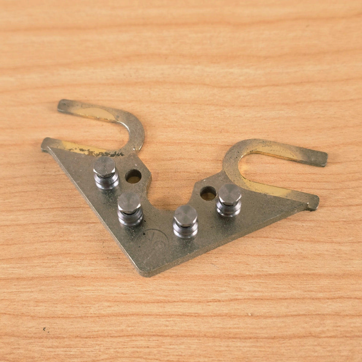 Overhead angled perspective of String Butler V3 faceplate and rollers