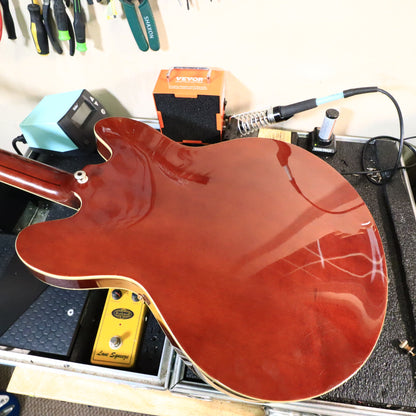 Rear view of guitar on workbench side angle 26/30 removed for brevity 25 removed for brevity 24 removed for brevity 23