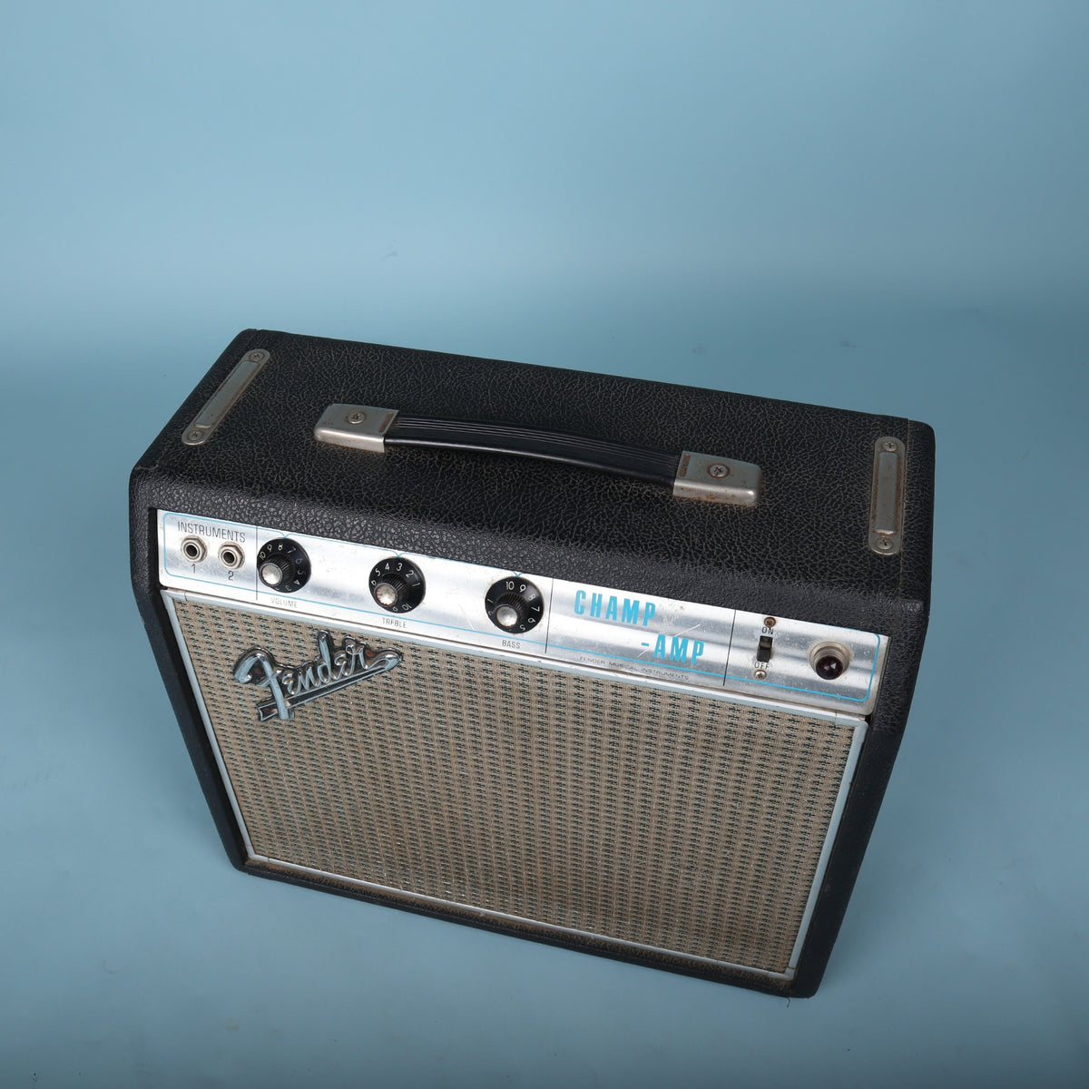 Right profile view showing the black textured vinyl covering.