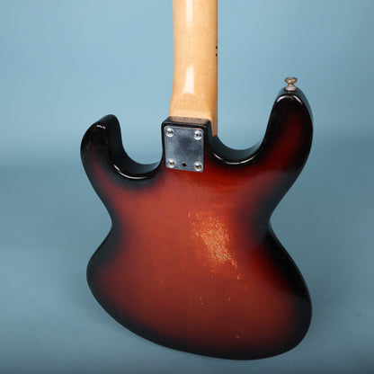 Neck plate and upper rear bout of the Peavey T-15 guitar.