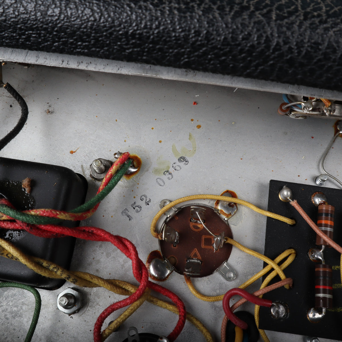 Internal chassis ink stamp reading T52 0369 near the transformer wiring.