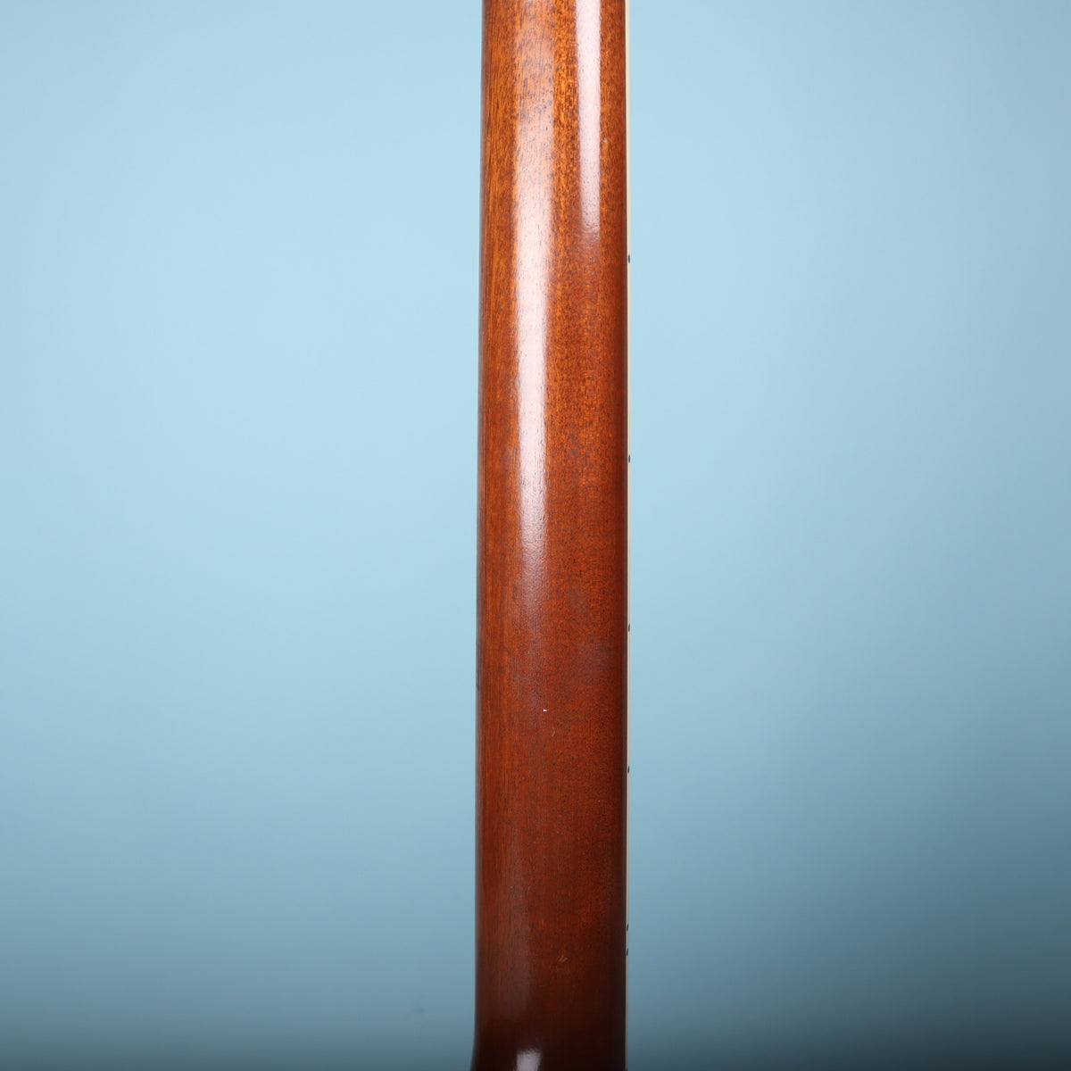 Rear view of the mahogany neck showing wood grain