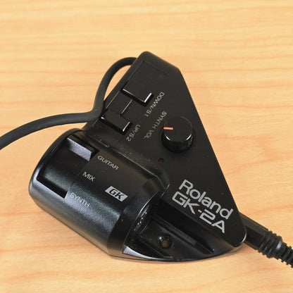 Top view of Roland GK-2A controller unit showing volume knob and switches.