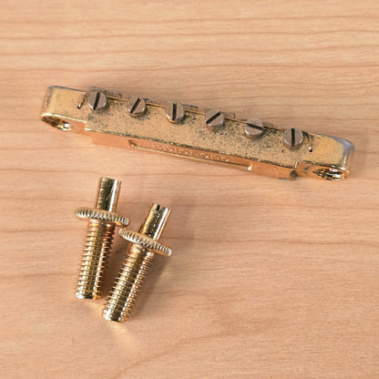 2007 OEM Epiphone Tune-o-Matic Bridge with Studs Gold Patina