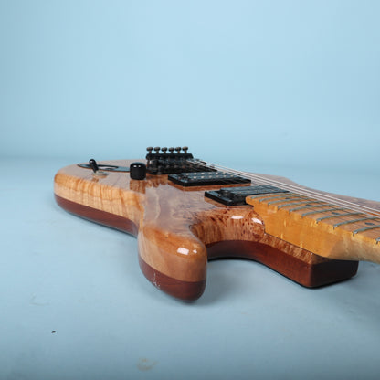 Underside of DiMarzio DP153 bridge humbucker pickup showing label and model number stampers. DP153 FRED model stamped on