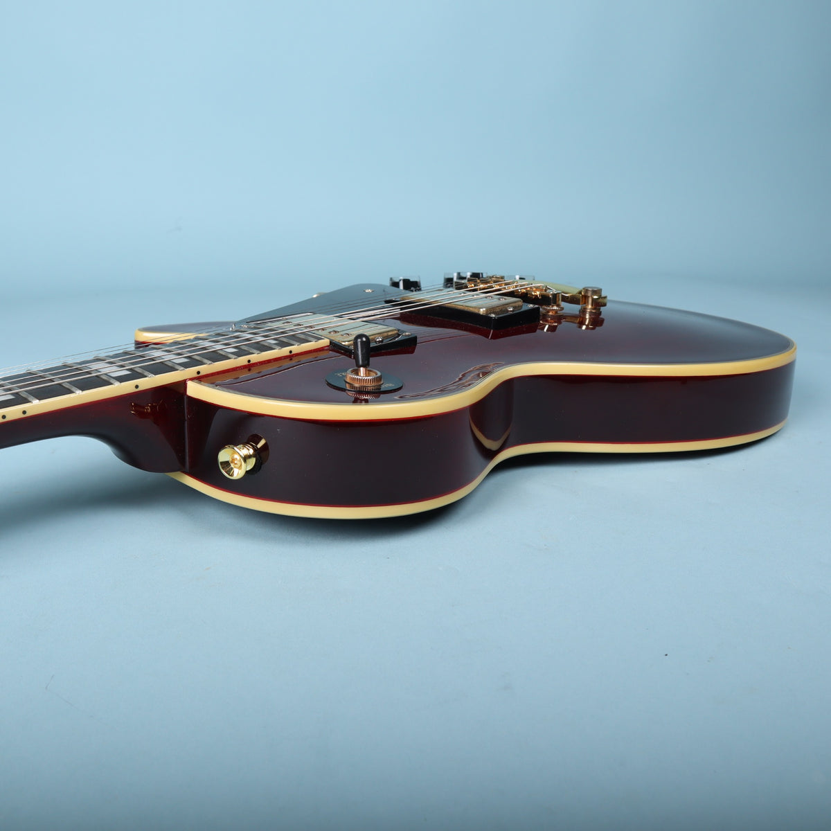 Cutaway profile view showing multi-ply cream binding