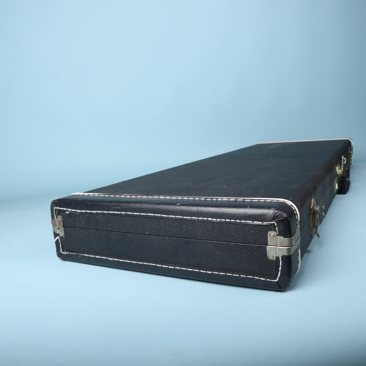 Tobias hardshell bass guitar case side edge and metal feet detail
