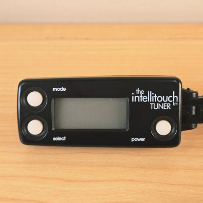 Front close-up of The Intellitouch Tuner displaying screen and mode, select, and power buttons.