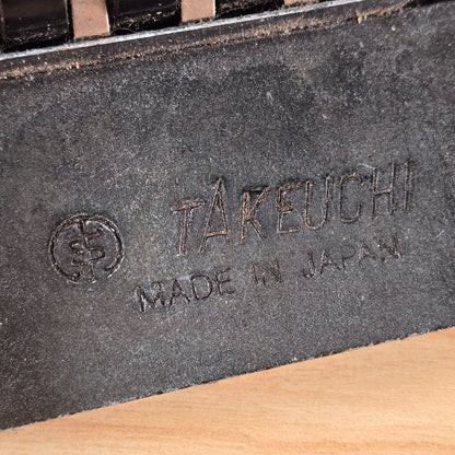 Close-up of Takeuchi Made in Japan stamp on tremolo block