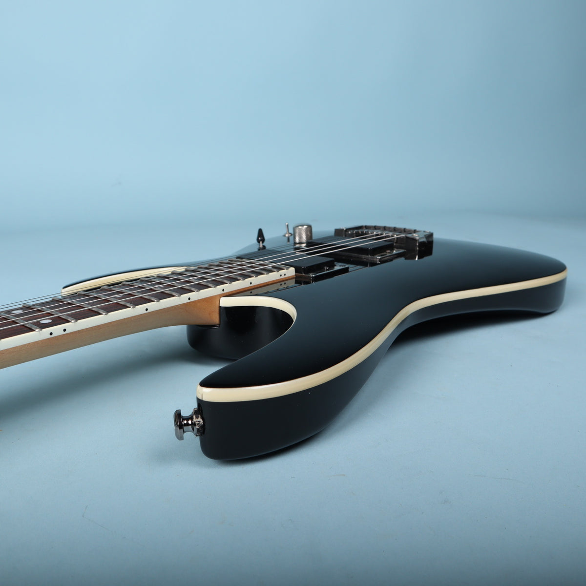 Upper horn profile view showing cream body binding on Ibanez RGA42