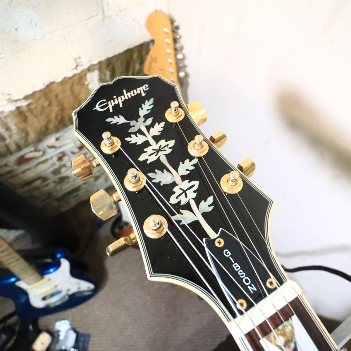 Front of headstock with vine inlay