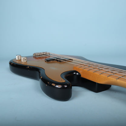 Side view of the lower cutaway rim showing finish checking and wear.