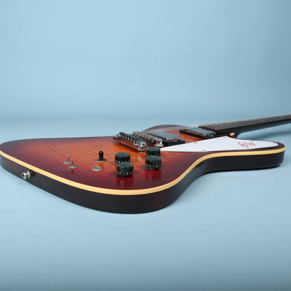Side profile of the lower body showcasing the cream top binding, output jack, and control knobs.