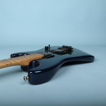 Side view of guitar body and upper horn