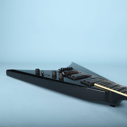 Low side perspective along the treble side of the body displaying the control knobs