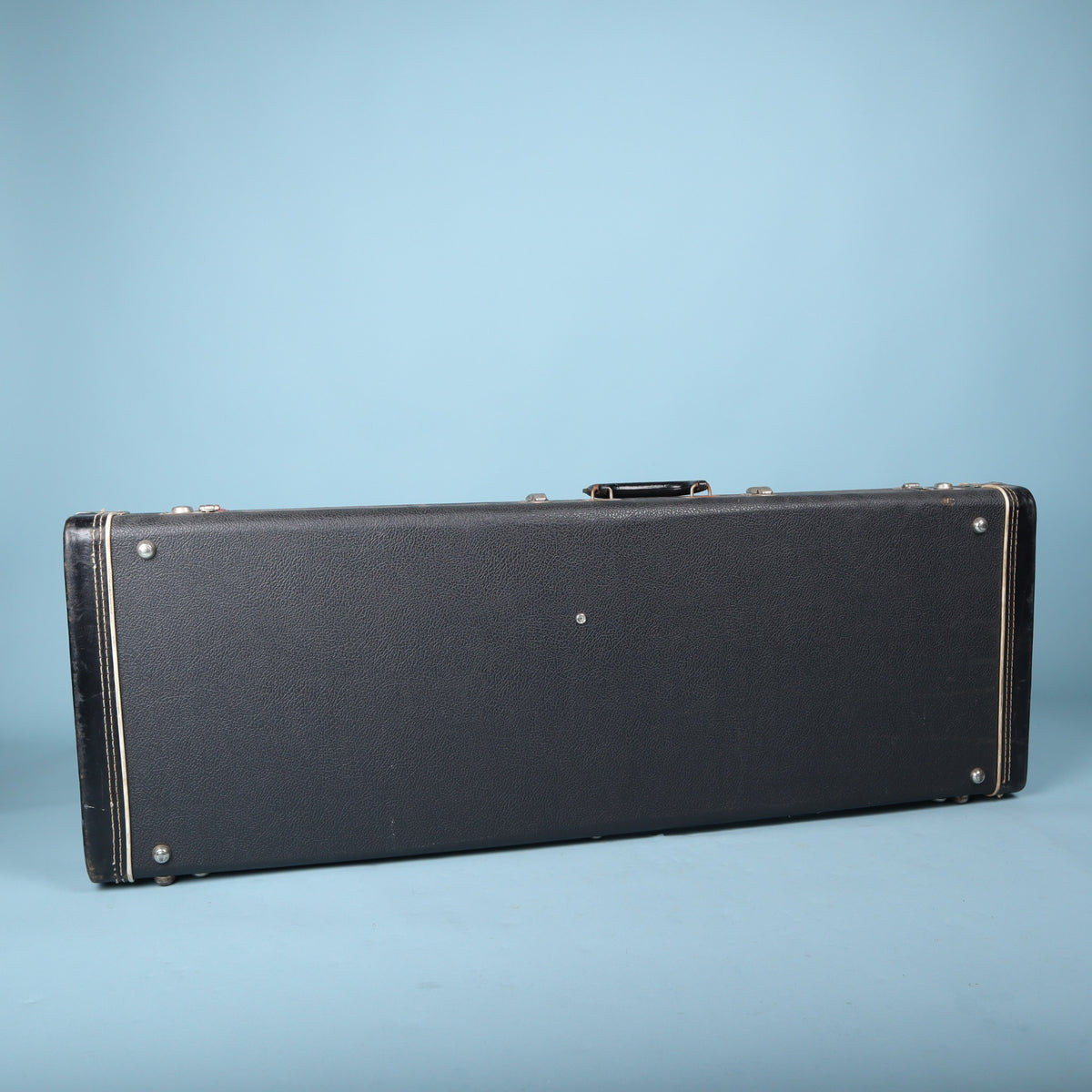 Top exterior view of closed vintage Fender guitar hardshell case