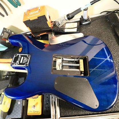 Rear body cavity and tremolo springs on workbench
