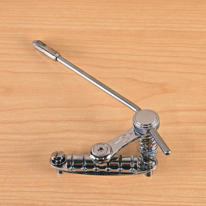 Overhead three-quarter view of the Duesenberg Les Trem II stopbar tailpiece assembly.