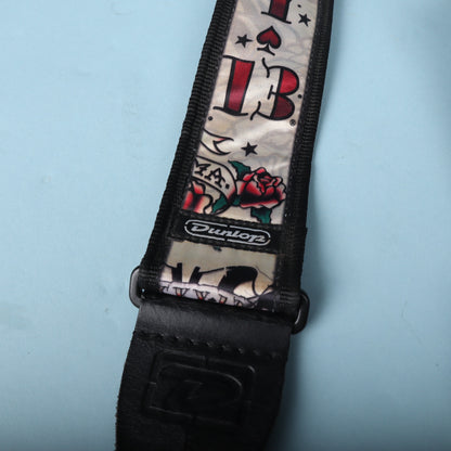 Detail of the stitched Dunlop rubber logo badge and black leather end tab