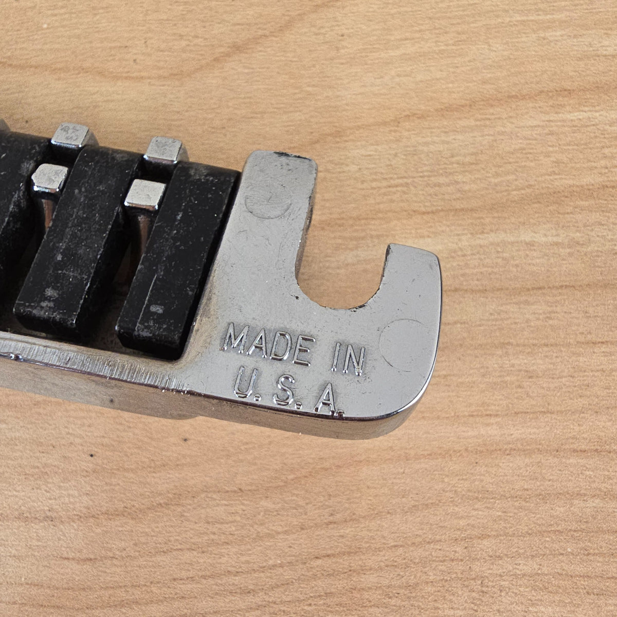 Close-up of the MADE IN U.S.A. stamp on the mounting ear