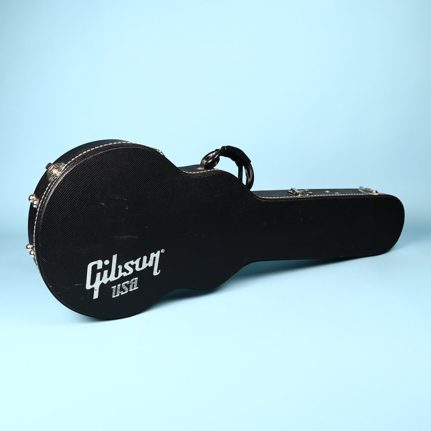 Gibson Made in Canada white plush-lined Les Paul shape electric guitar hard case