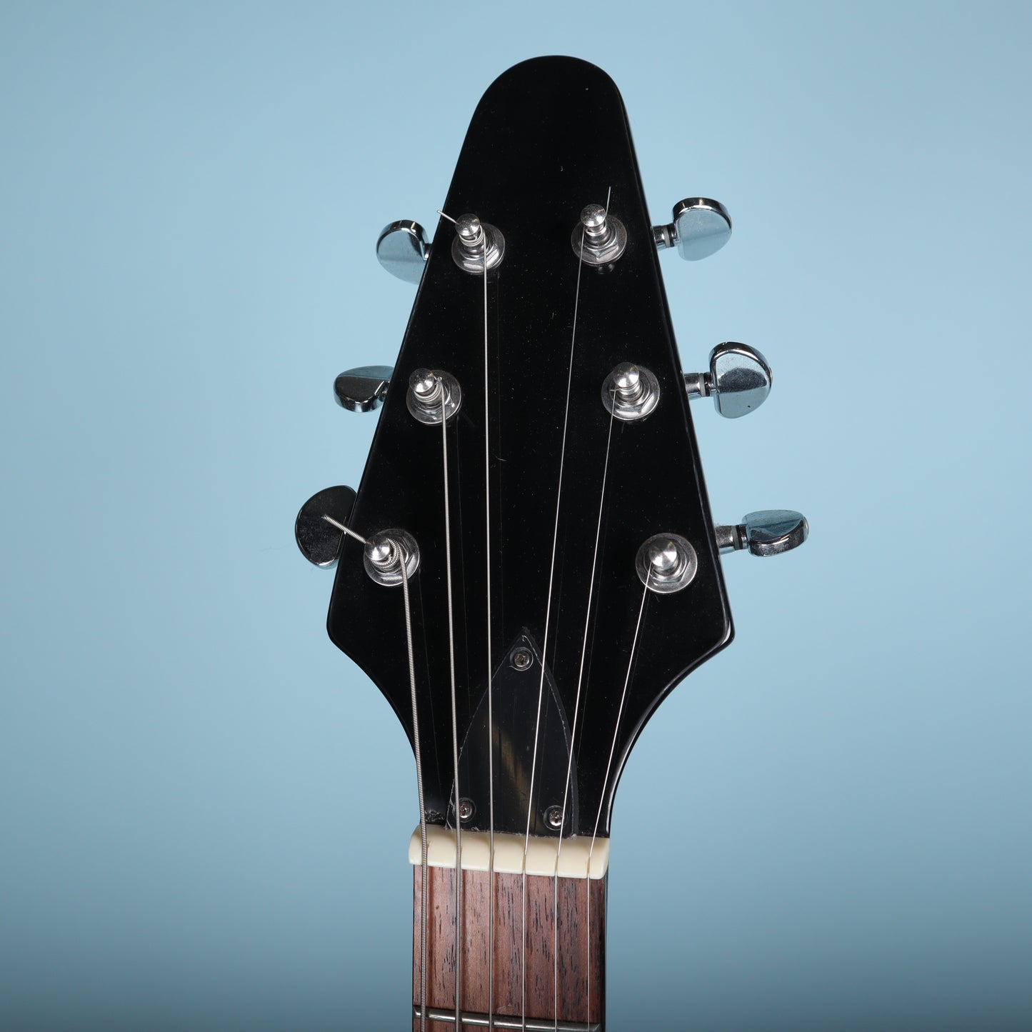 Flying V Style Electric Guitar in Black with White Pickguard