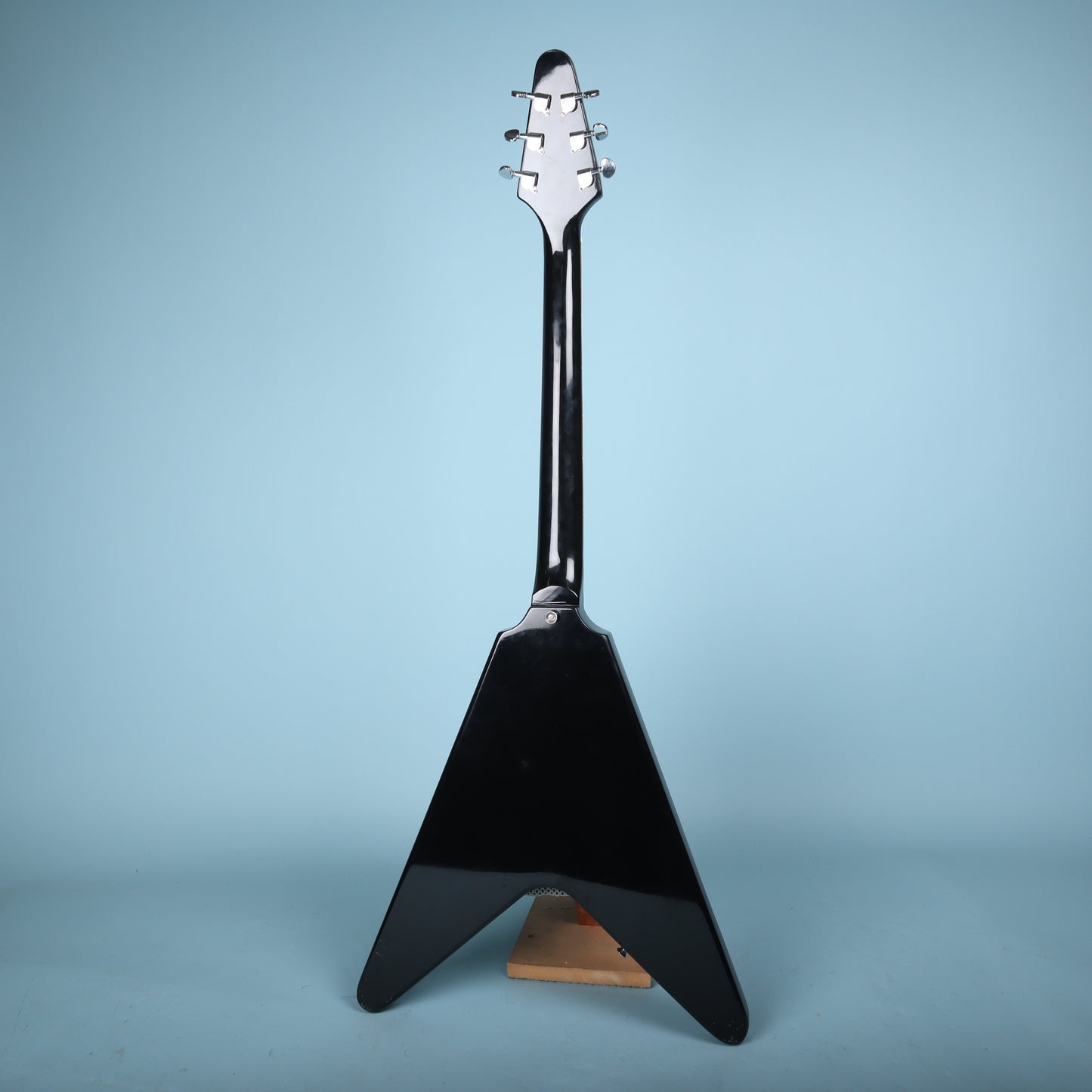 Flying V Style Electric Guitar in Black with White Pickguard